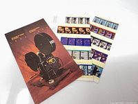 Front view showing vintage film camera card and two 5-stamp strips