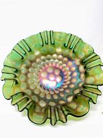 Top view showing coin dot pattern and iridescence