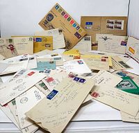 Wide view of assorted envelopes and covers spread out