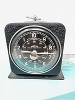 Front view of Smiths interval timer showing dial and case