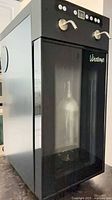 Front angled view of Vinotemp wine dispenser showing overall exterior