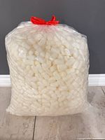 Front view of sealed bag of packing peanuts
