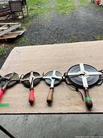 Four open-reel survey tapes aligned on table