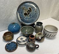 Group shot showing all ten pottery pieces