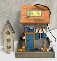 Front view of bait shop and birdhouse