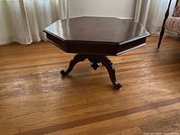 Full view of octagonal table on hardwood floor