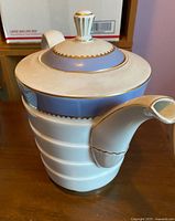 Left side view of Rosenthal Bavaria Madeleine teapot showing handle, tiered body and lid