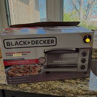 Front of retail box showing brand, model and features