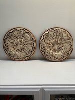 Both copper wall plates front view