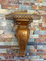 Front view of MDF ornate corbel shelf showing carved details and finish