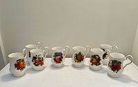 Eight Royal Windsor fruit motif cups front view