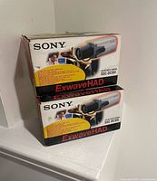 Front view of two Sony ExwaveHAD camera boxes