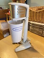 Mixer and cup assembled side view