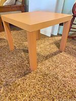 Full view of end table showing legs and overall structure