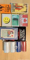 Five playing card decks, poker chips in plastic case, Hoyle rule booklet