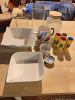 All containers arranged on tabletop showing full lot