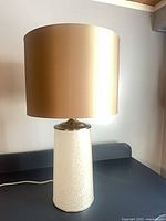 Full view of lamp showing shade, base, and power cord