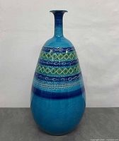 Full view of blue and turquoise Italian ceramic vase