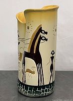 Full view of vase front with horse motif
