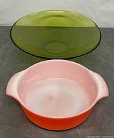 Orrefors green bowl and Fire-King casserole side by side