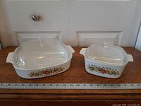 Both casseroles side by side with lids shown for size reference