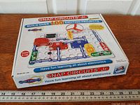 Closed kit box front showing branding and project claims