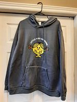 Full front view of grey Little Miss Sunshine hoodie on hanger