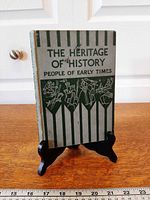 Front cover of the book on stand