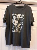 Front view showing Practical Magic graphic and overall color