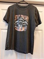 Front view of graphic T-shirt on hanger