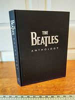 Front view of black cloth hardcover with silver title