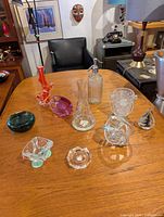 All eight glass items displayed on table