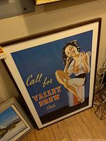 Framed Valley Brew Ale advertising poster leaning against wall