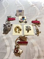All six jewellery items laid out for overview