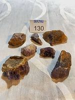 All seven amethyst chunks displayed on table