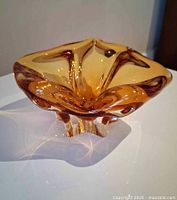 Top view of free-form amber Chalet art glass ashtray