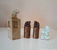 Group view of four soapstone seals