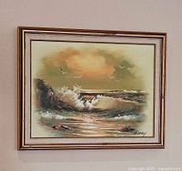 Framed painting hanging on wall