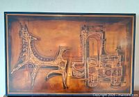 Frontal view of framed acid-etched metal artwork