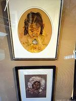 Both framed prints hanging together for overall view