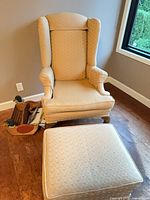 Full view of armchair and ottoman