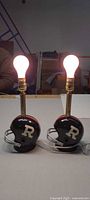 Both helmet lamps illuminated to show working order