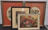 Group shot showing all four framed floral artworks