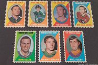 All seven stamp-style hockey stickers laid out