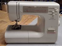 Front and left side view of Janome Decor Excel Pro 5124 sewing machine