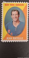 Front of perforated stamp card with Jean Ratelle portrait