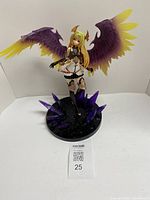 Full view of Kotobukiya Dark Angel Olivia statue with wings and crystal base