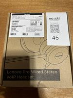 Front of sealed Lenovo Pro Wired Stereo VoIP Headset box