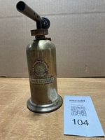 Front view showing whole blow torch and scale card