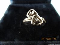 Front view showing double heart motifs and stones